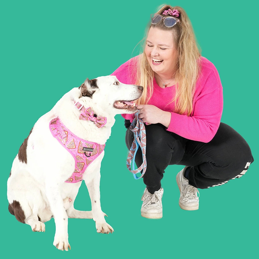 Teggun Ashleigh in a pink top with her cute dog smiling